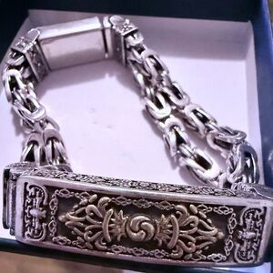 Elegant Silver Bracelet with Gold Accents